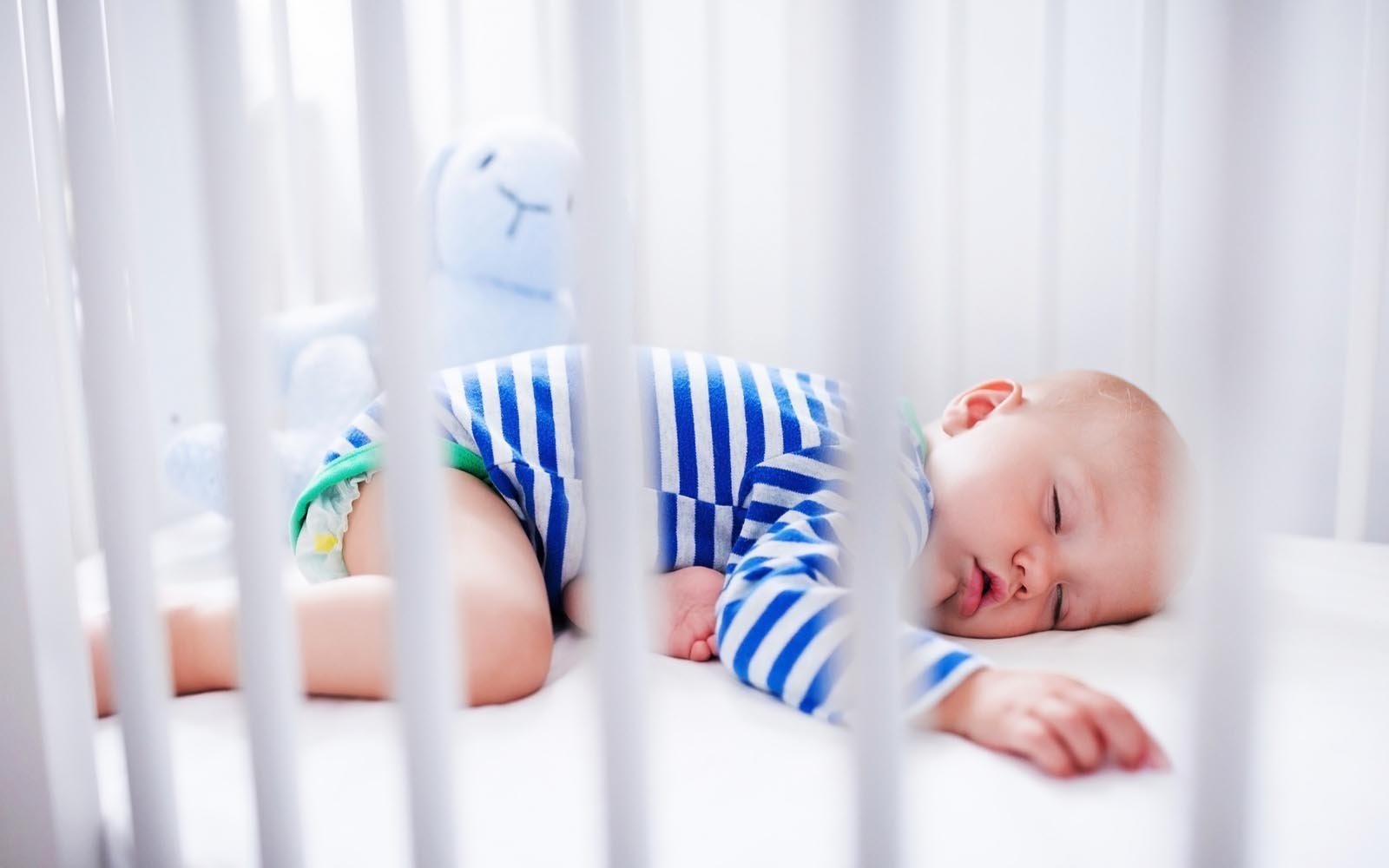 Picture of a very tired 7 month old baby who has been waking all night