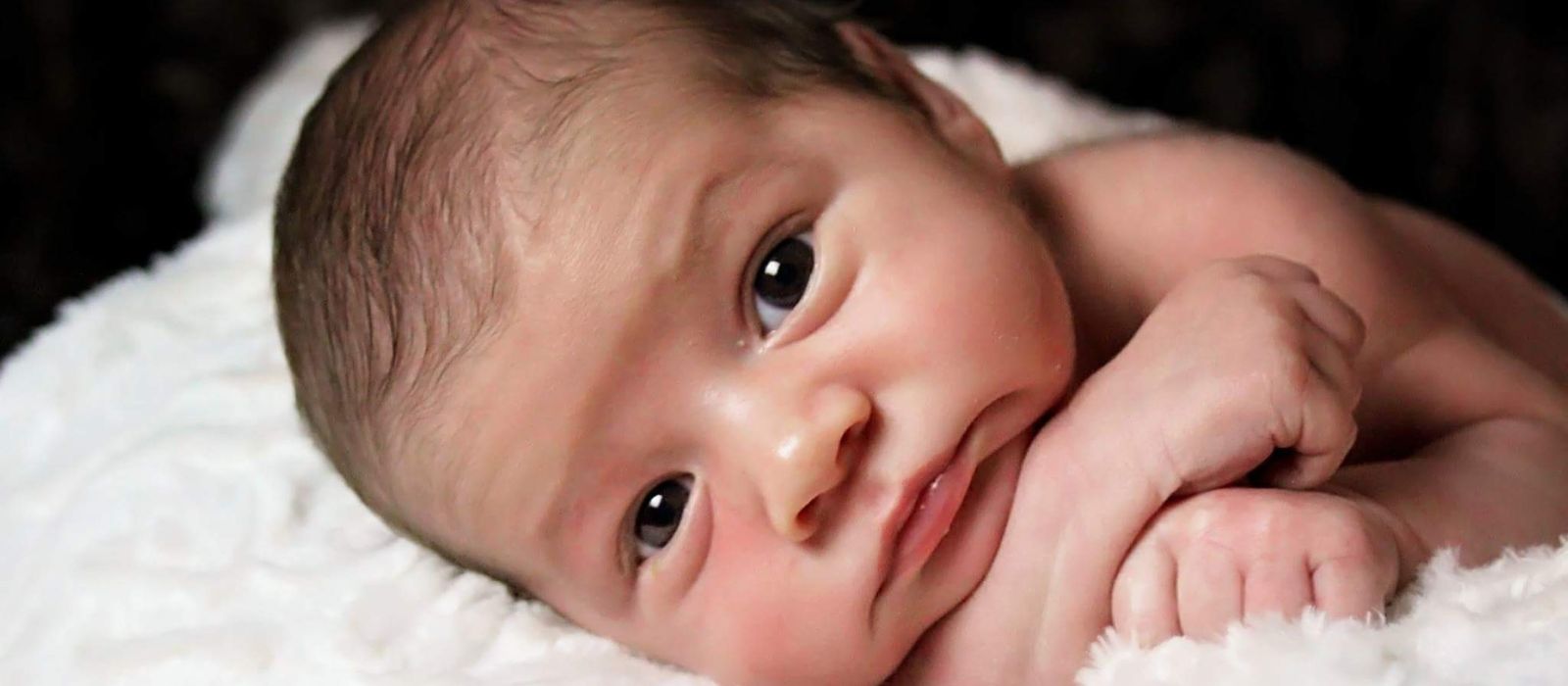 Newborn baby resting in sleep schedule